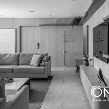 Modern living room with neutral tones and minimalist design.