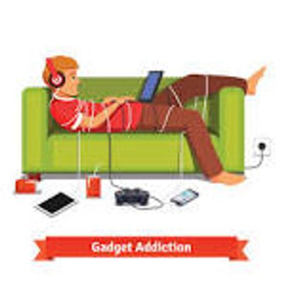Young man lounging on a couch surrounded by gadgets, illustrating gadget addiction.