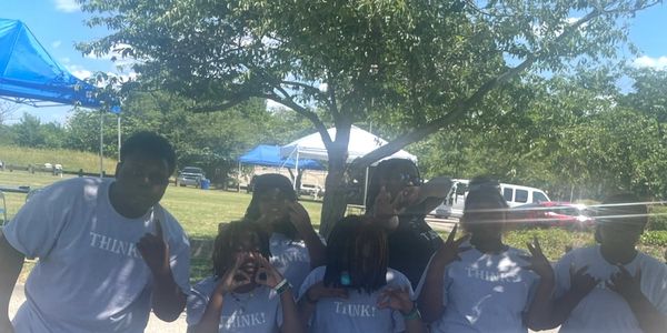 Youth Volunteering and showing support for a local Community Center Event. 