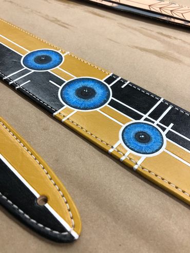 Detail shot of a new Custom Flutterswine strap for a Fender Telecaster guitar.