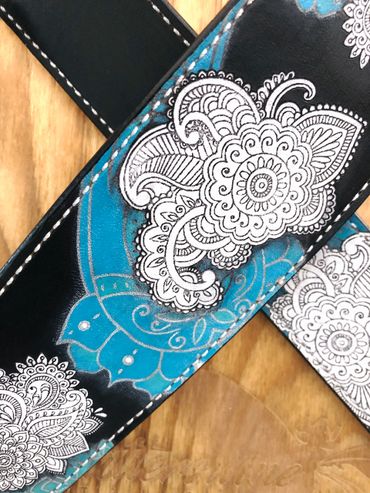 “It’s all Black & White & Blue” an original Flutterswine hand painted leather guitar strap, detail