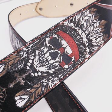 Detail of Indian skull logo on black leather guitar strap.  Flutterswine custom 