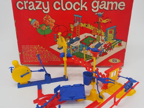Vintage Crazy Clock Game with colorful plastic parts and red box.
