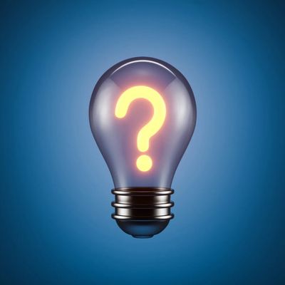 Light bulb with glowing question mark inside on blue background.