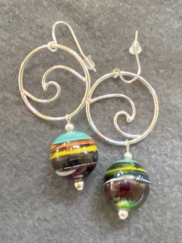 Sterling wave earrings with Surfstone beads. One of a kind. Handmade.