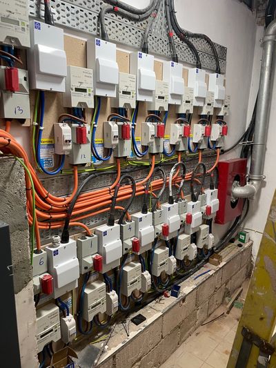 Organized electrical meters and wiring in a utility room with numbered labels.
consumer unit upgrades
EICR services
electrical installation