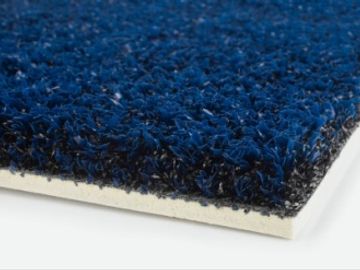 Close-up of a blue textured mat with a white base.