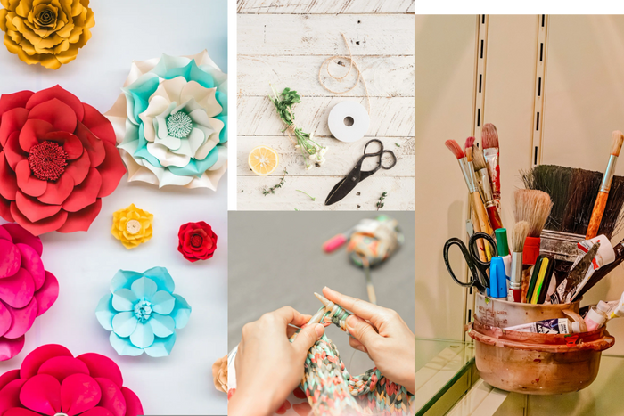 Stack of books next to pencils in a holder and a camera.