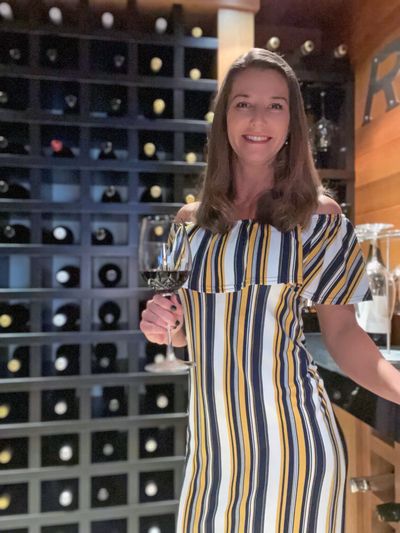 Jennifer Tocher in a custom-designed wine cellar located in Kelowna, BC.