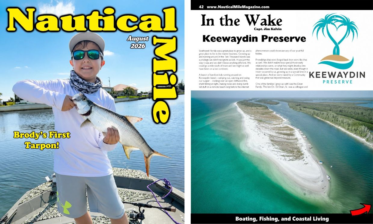 Boy holding a tarpon fish on a boat in Nautical Mile Magazine.
