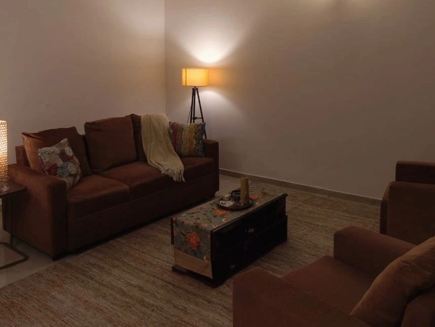 Cozy therapy room with warm lighting.