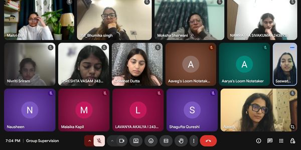 A virtual group video call with multiple participants and muted microphones.