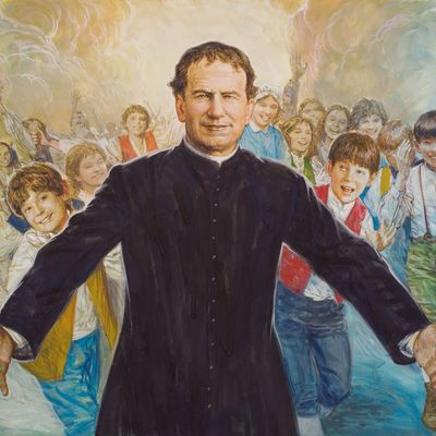 A priest warmly welcomes a group of happy children with open arms.