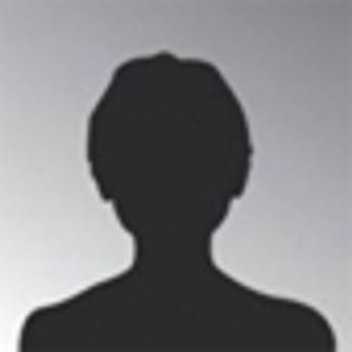 Silhouette of a person against a plain background.