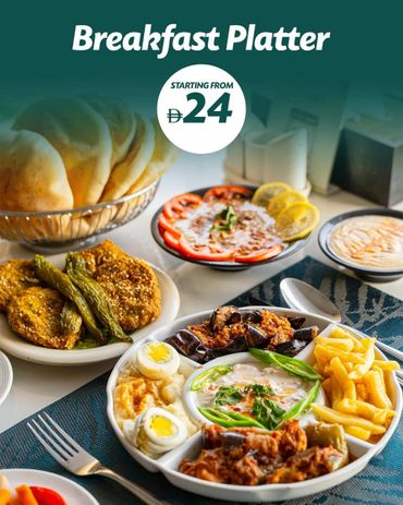 A colorful breakfast platter with various dishes and fries, priced from 24.