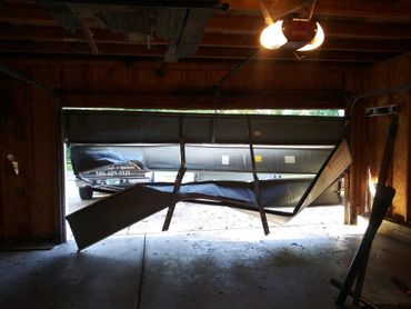 Inside/interior view of damaged garage door replaced.