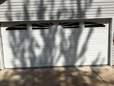 New replacement for damaged garage door.