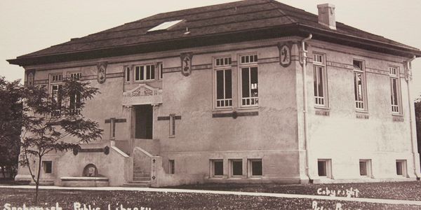 Vintage photo of Snohomish Public Library building with classic architecture.