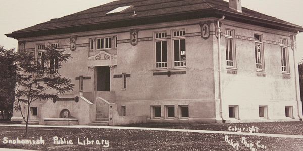 Vintage photo of Snohomish Public Library building with classic architecture.
