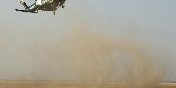 A139 landing at desert, possible brown out due to sand, flight safety risk