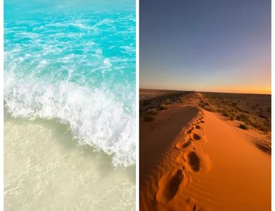 Clear ocean waves gently crashing on a sandy shore.