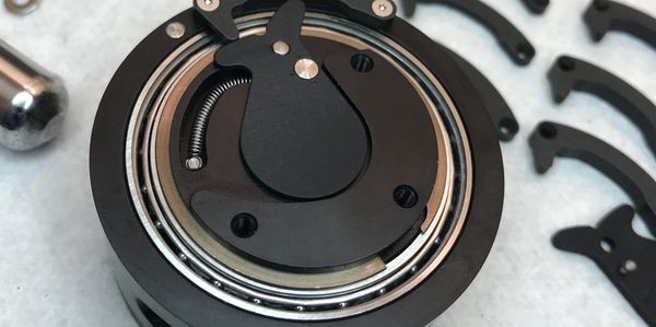 Integrated product with machined, sheet metal, and hardware component parts