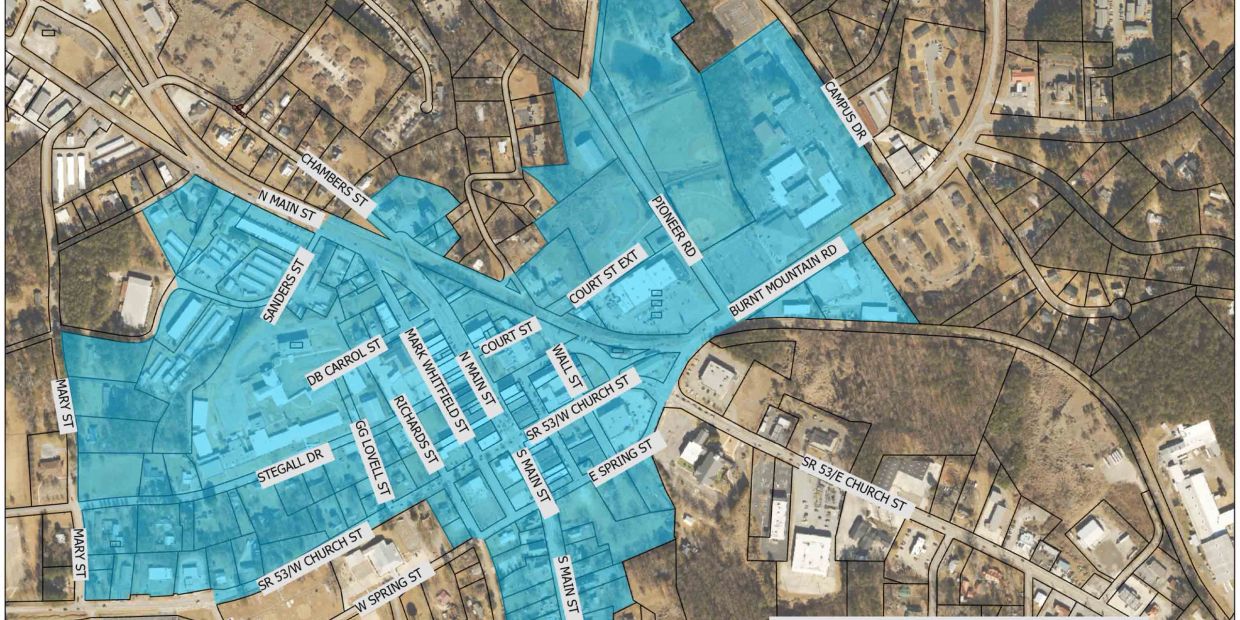 Map highlighting a town area with labeled streets and shaded zones.