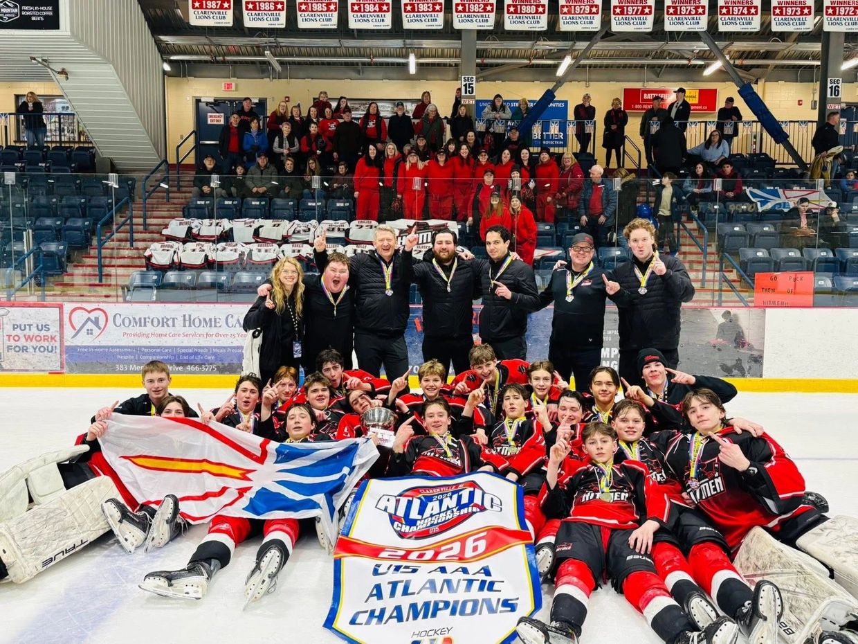 Youth hockey team celebrates winning the 2026 U15 AAA Atlantic Championship.