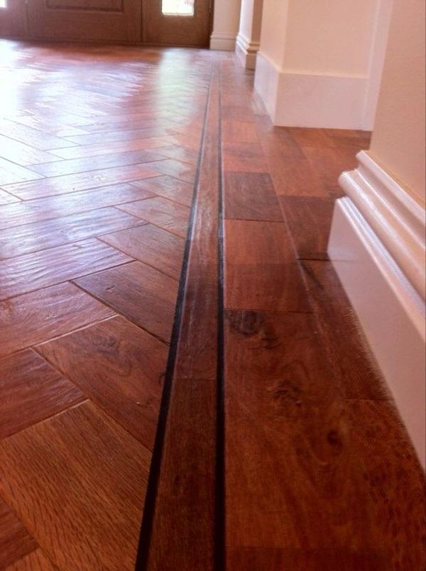 Herringbone LVT installer
