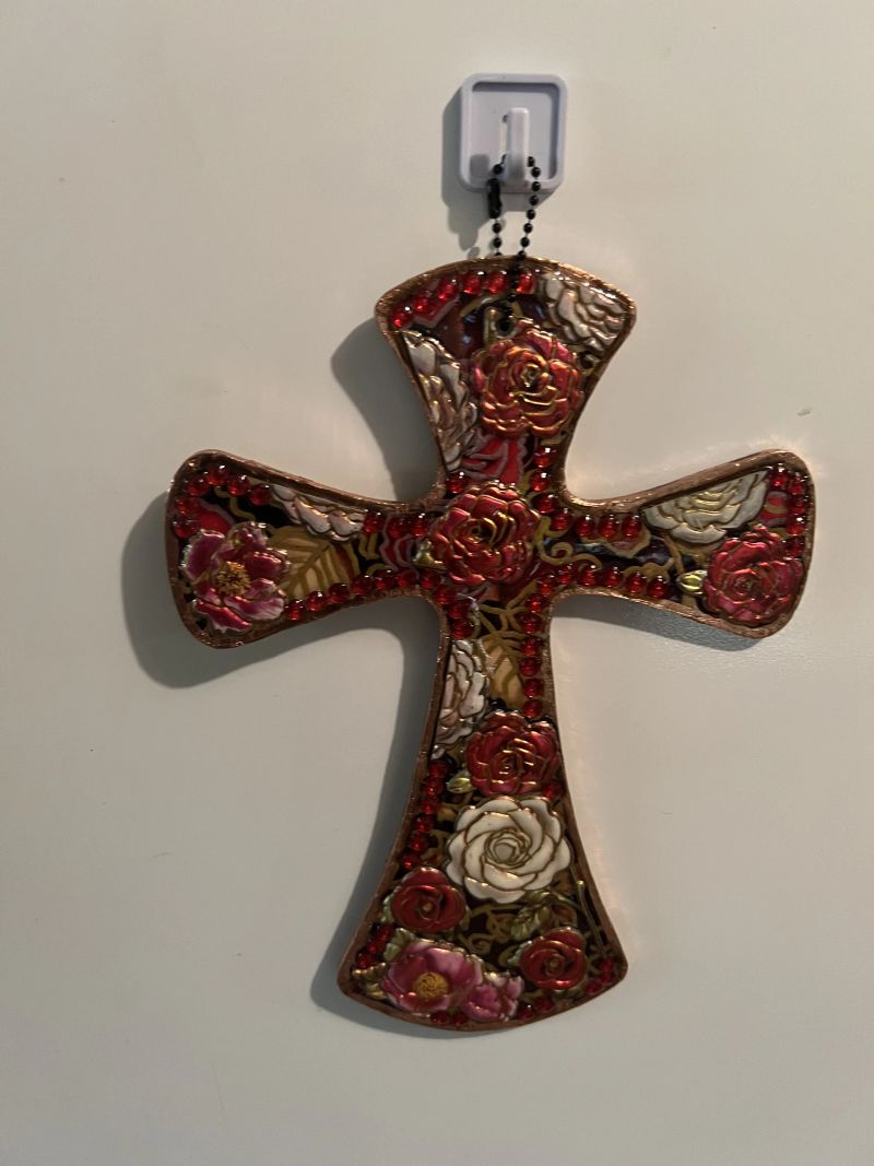 Handcrafted wooden cross wall hanging embellished with roses and colorful flowers