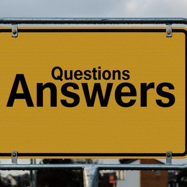Sign with the text: Questions and Answers