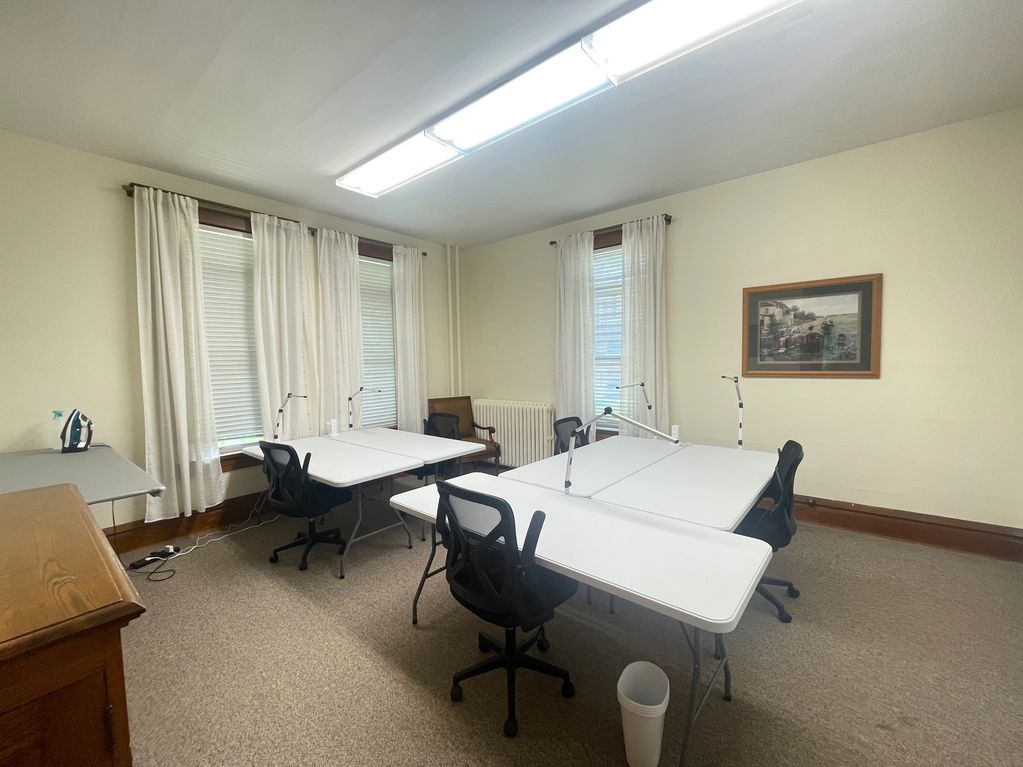 Each workspace includes five 6 foot tables, chairs with wheels, great natural and ceiling lighting, 
