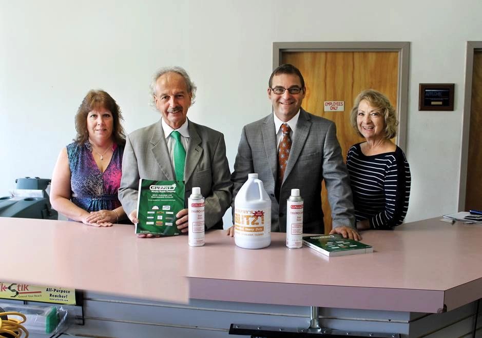 Photo of team members behind customer service counter