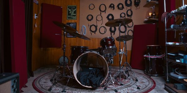 A drumset and cable wall at The Candyshop Studios' music studio in Boulder, Colorado