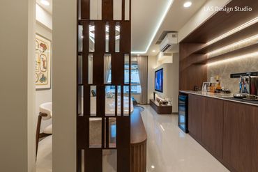 Modern living space with wooden accents and sleek lighting.