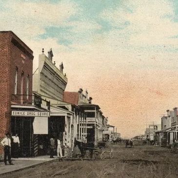 Early colorized photo of Second Street in Eunice, facing North