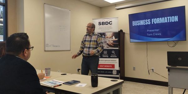 Tom volunteers to teach classes at the Small Business Development Center.