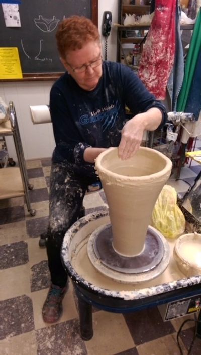 Lyn Reed using clay.