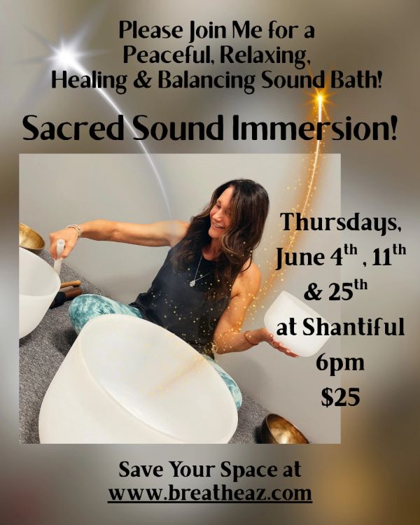 Woman offering a sacred sound immersion healing session with crystal bowls.