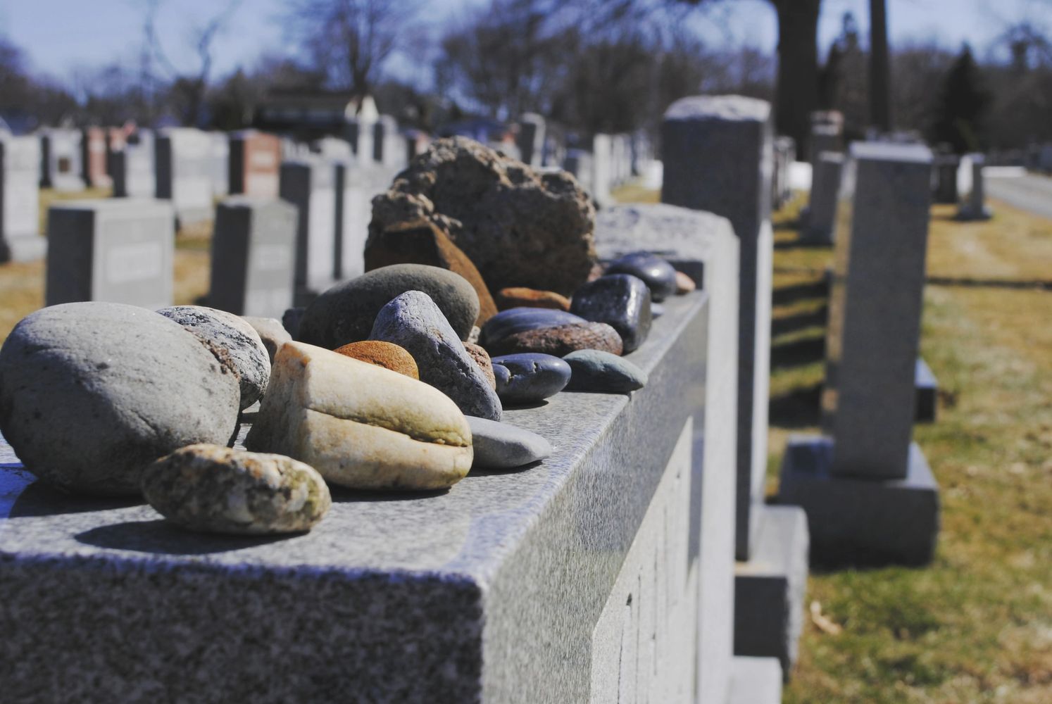 Stones on top of monument at Britton Road Cemetery in Rochester NY