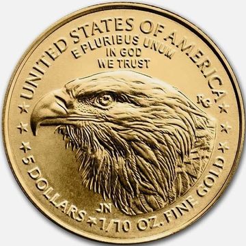 Close-up of a gold coin featuring an eagle's head.