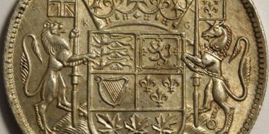 Close-up of a crest on a coin.