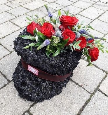 Hat with roses. Sympathy flowers for funeral in York