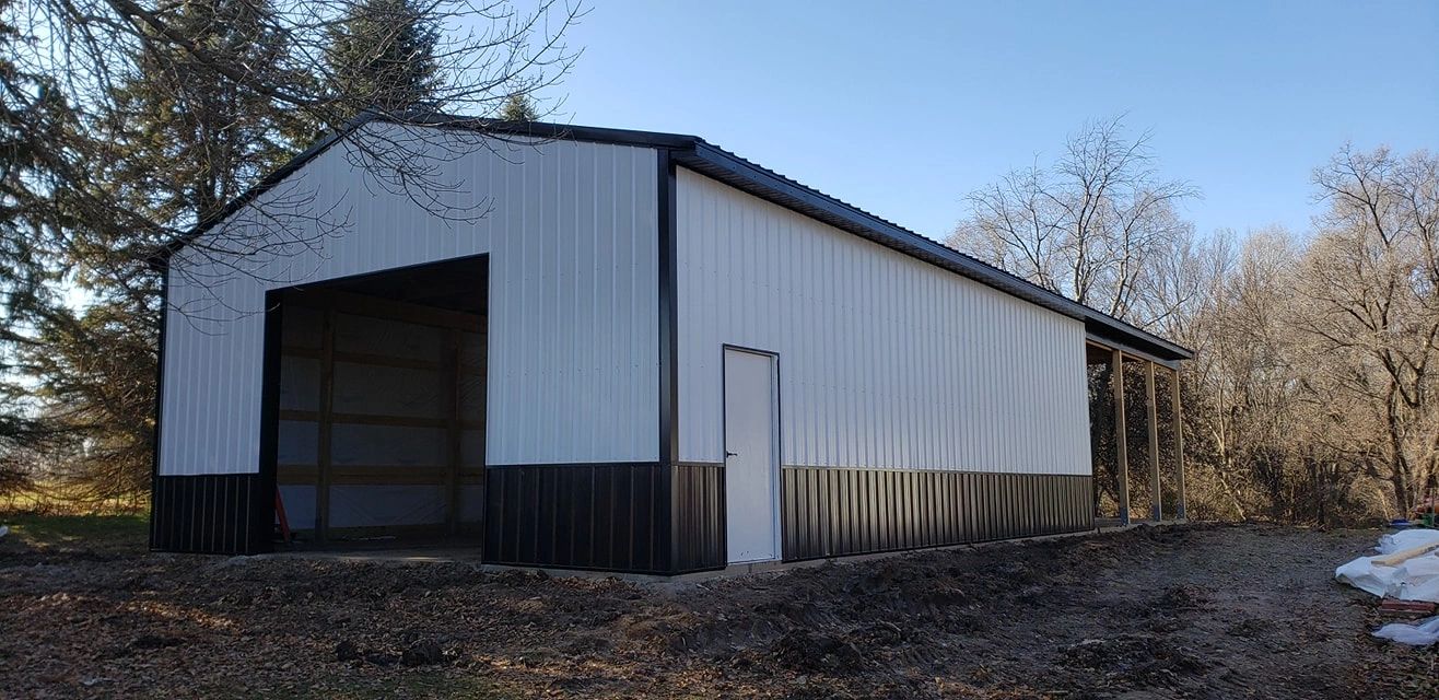 This building has a covered patio section seen in the back.