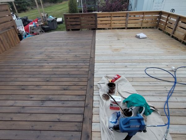 Halfway through staining a deck. Product: Benjamin Moore Woodluxe Oil-based stain.