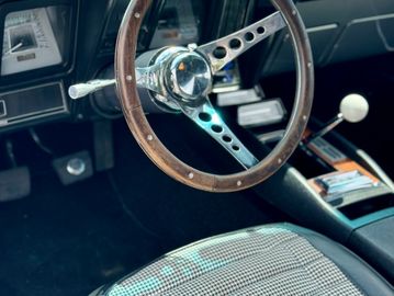 interior detail of vintage Camaro after receiving a detail 