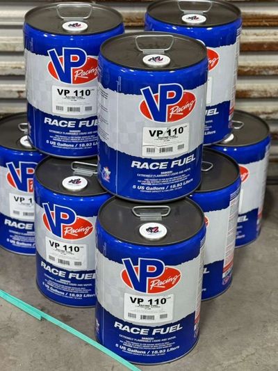 Stack of blue VP Racing Race Fuel containers.
