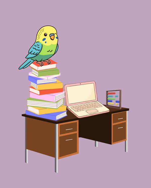 Cartoon bird perched on books next to laptop on desk.
