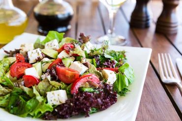 Greek Mediterranean salad with feta cheese, tomatoes, and peppers.
