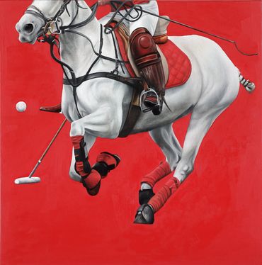 White polo pony with red wraps.